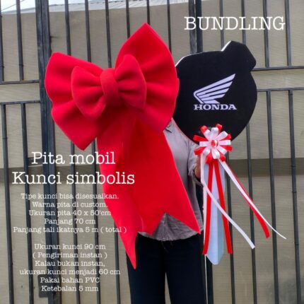 Pita Mobil dan Kunci Simbolis